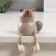 Ceramics bell "Gray cat with hanging paws" 6.8x8.1x8.2 cm