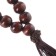 Decoration on the handle of the checkpoint, beads for luck, wood, dark cherry