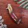 Wooden souvenir "Butterfly knife" Rainbow lines
