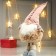 Interior doll "Grandpa in a fur coat and pink cap" 48x16x21 cm