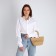 Female wicker bag without fastening, beige color