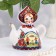 Bell doll on a teapot, 10 cm, mix