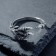 Ring "Right" claws, color black silver, dimensionless