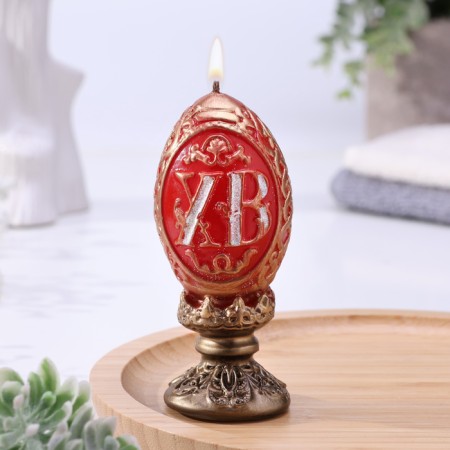 Decorative candle "Easter egg carved"