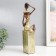 Souvenir Polystone "African with a jug, on the stand" Gold Pattern - circles 10.5x8x33.5 cm