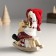Polystone souvenir "Baby in a large red hat on a toy-rocking toy" 6x10x13 cm