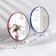 The desktop mirror is a suspended “circle”, bilateral, with an increase, D mirror surface 18.5 cm, color mix