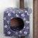 House for cats with a claw, with a site and shelf, 65 x 51 x 173 cm, gray with paws