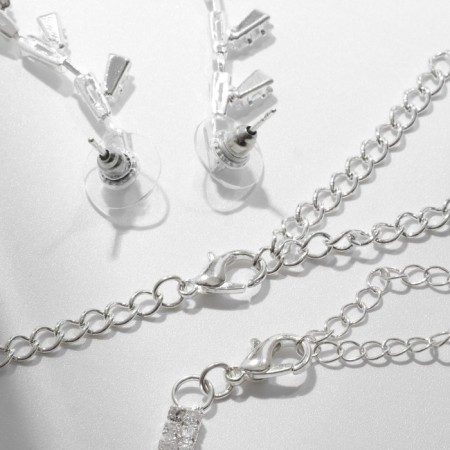Set 4 objects: earrings, necklaces, bracelet, ring "pattern" thin, white color in silver-1