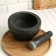 A mortar with a pestle made of stone is large, 1000 ml, black, in the box