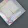 A packet for a cake with a square bottom and window, holographic, 15 x 15 x 15 cm