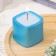 Candle "Square. Marble" in a candlestick of gypsum is small, 5x4.5 cm, blue
