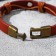 Bracelet Skin "Skull" is small, with bones, the color is light brown with black gold, 8 cm