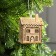 Christmas tree toy "Carved house", from batteries, glow warm white