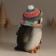 Polystone souvenir "An angry penguin in a hat with a bomb, in a colored scarf" 9.5x9.5x12.5 cm