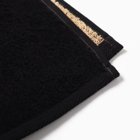 The towel is the Named Tensor Ethel "Andrey" black, 50x90cm, 100% cotton, 420g/m2-3