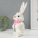 Souvenir "White Bunny with a pink bow and Easter eggs" 12x12.5x25 cm