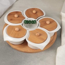 A set of ceramic bowls for snacks on a wooden stand 