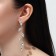 Hanging earrings with rhinestones "Listopad", white color in silver, 9 cm