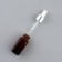 A glass bottle for storage with a pipette, 10 ml, brown/white color