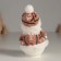 Souvenir Textile "Snowman in a knitted brown fur coat" 7.5x7.5x13 cm