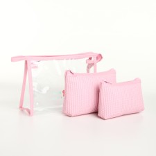 A set of cosmetic bags 3 in 1 on a zipper, pink color