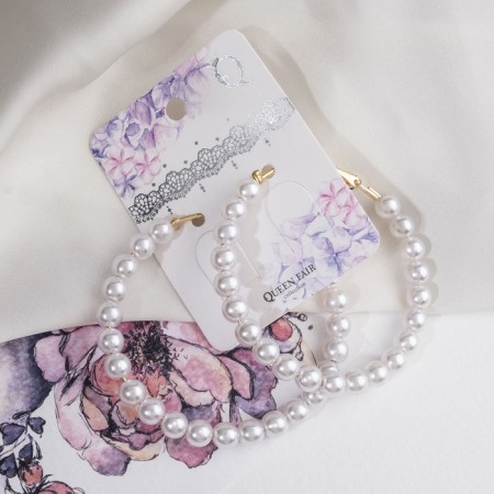 Earrings-rings "Tenderness of pearls" are medium ring, white color in gold, d = 5.5 cm-1