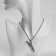 The pendant of the "dagger" in the sheath, the color is black silver, 70 cm