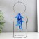 Dolphins pendulum opposite each other with a ring of 16 x 9.5 x 18 cm