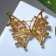 Brooch "Butterfly" mother of pearl, colored in gold