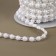 Pearls on threads, with holography, flat, 6 mm, 9 ± 1 m, white color