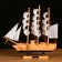 The ship souvenir medium "Ginder", board is light wood, white sails, 30x7x30 cm