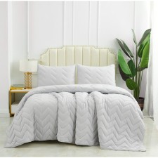 The bedspread and pillowcase 