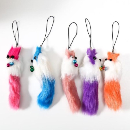 Fluffing on a pendant with colored bells mix-8