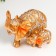 Souvenir Polystone "Golden Elephant with an Elephant in the Mirror Popon" 17.5x15x9.5 cm