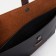 Male clutch, black/brown color