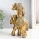 Souvenir Polystone "Golden Elephant with an elephant on the back - circus blanket" 20x5x16 cm