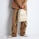 Women's backpack made of artificial leather with lightning, 1 pocket, milk color