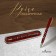Gift handle, ball "glow" in a plastic case, rotary, red body with silver