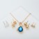 Set of 5 objects: 4 pairs fluffs, pendant “droplet”, white-blue color in gold, 40 cm