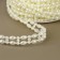 Pearls on threads, flat, 10 mm, 9 ± 1 m, milk color