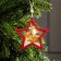 Christmas tree toy "Red Star with deer", from batteries, glow of warm white