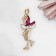 Brooch "Skill", white-raspberry color in gold