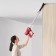 Vacuum cleaner KitFort KT-5239, vertical, 600 watts, 0.8 l, red-white