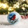 New Year's ball "Bullfire on a branch" 8 cm