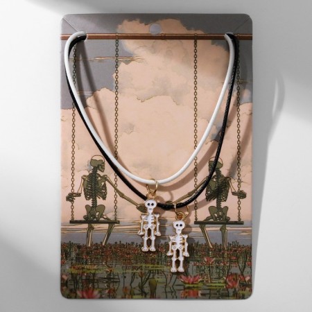 Kulons "Uzemkhniki" skeletons, white-black color in gold, 45 cm-3