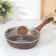 Granit Ultra Red, D = 24 cm pan, plastic handle, glass cover, anti -stick coating, brown color
