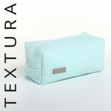 Cosmetic bag at the zipper textura, turquoise color