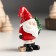 Suvenir Polystone "Santa Claus in a red cap with a Christmas tree/gift" mix 5x3.8x8.2 cm