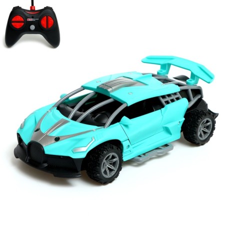 Radio -controlled machine "Racing", works from batteries, doors, light effects, and mixing are opened